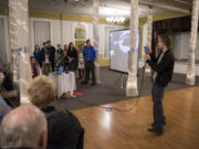Connor Goglin, a consultant with Washington State University Vancouver’s augmented reality program, explains how the Providence Academy Journey app shows the building’s history in the space where it happened.