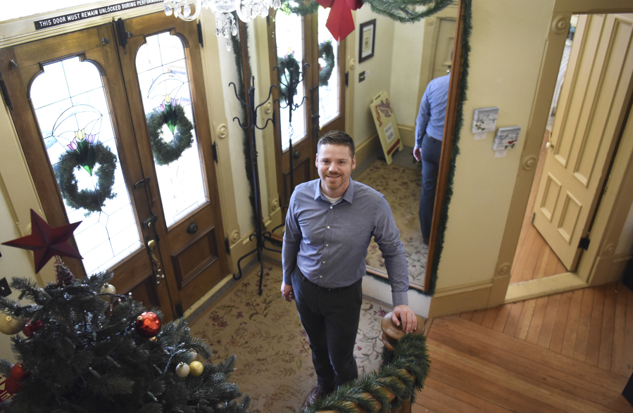 Jordan Boldt, director of the Vancouver Farmers Market, is pictured in the entryway of the Slocum House in downtown Vancouver.