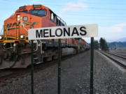 A BNSF train passes the Melonas siding west of Stevenson in the Columbia River Gorge. The stretch of track was named in December for a family with three generations of railroad workers.