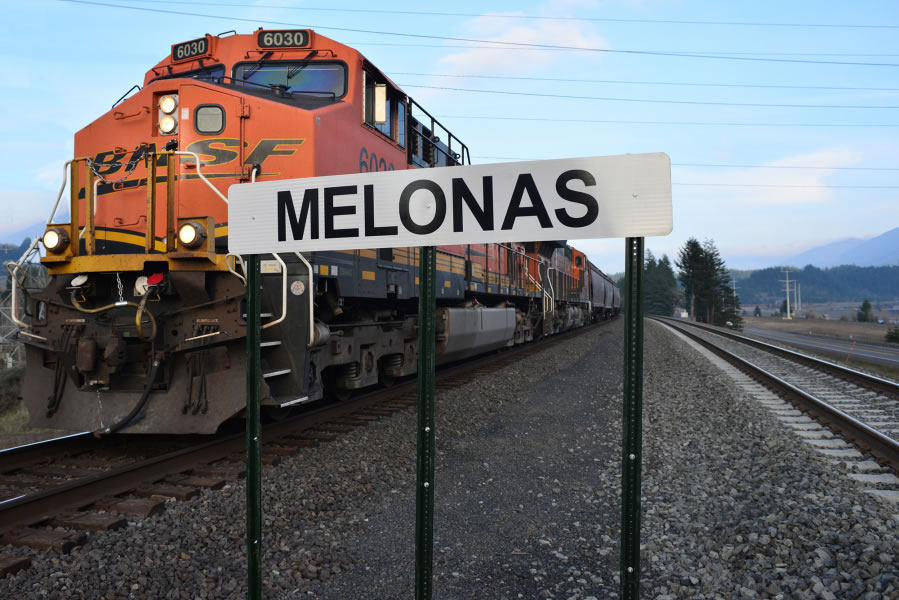 A BNSF train passes the Melonas siding west of Stevenson in the Columbia River Gorge. The stretch of track was named in December for a family with three generations of railroad workers.