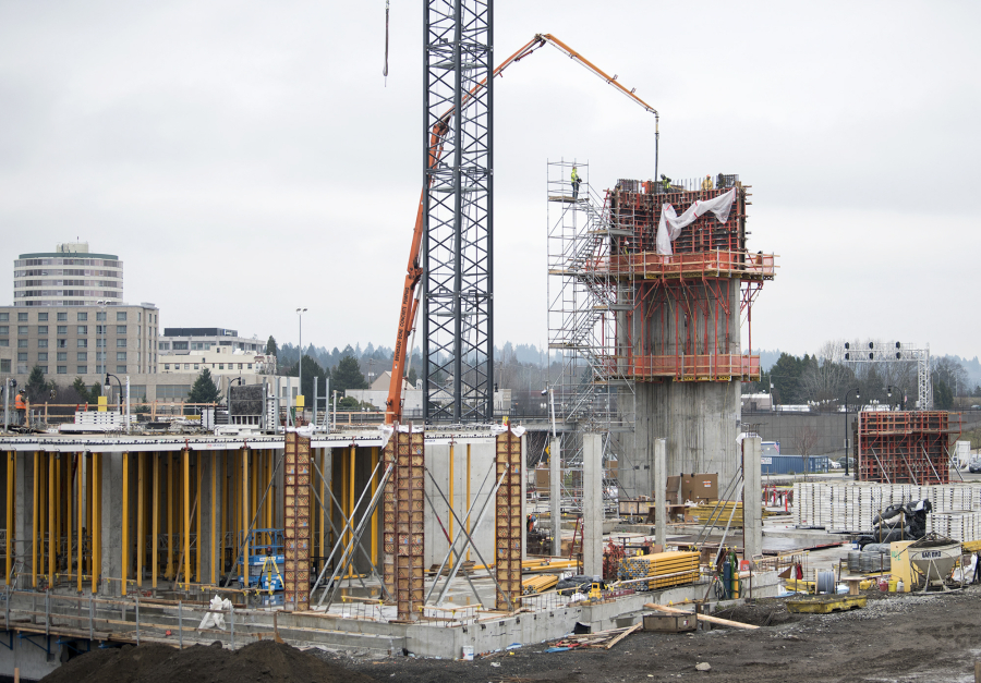 Construction continues on Block 6 at The Waterfront Vancouver on Friday morning. Gramor Development, the Tualatin, Ore.-based firm overseeing the redevelopment, said two buildings on the block could be completed by September.