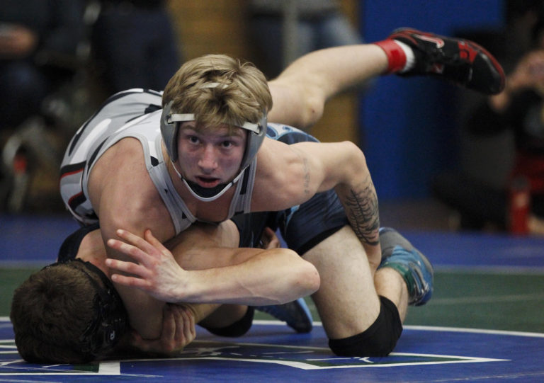 Noah Talavera of Union, top, wrestles Dale Anderson of Hockinson in the 145 pound championship match at the Pacific Coast Wrestling Championships at Mountain View High School.