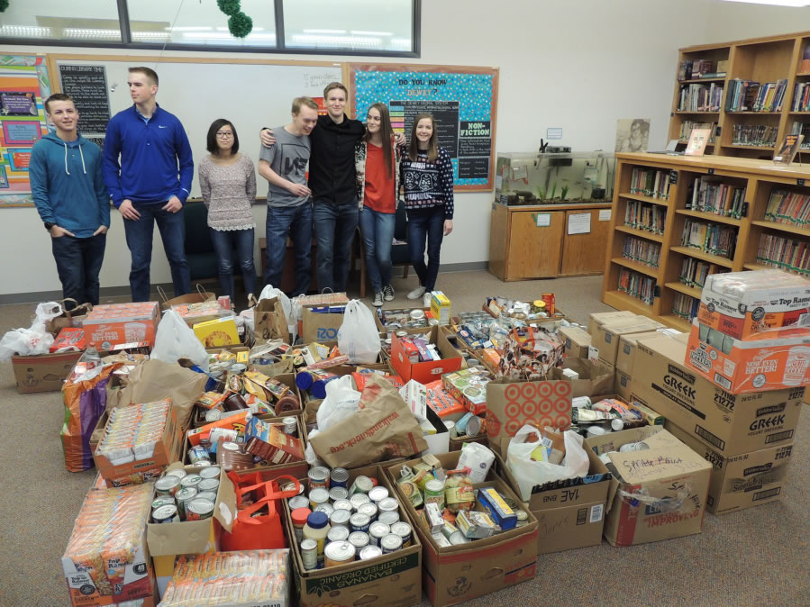 Battle Ground: Officers at Firm Foundation Christian School’s Associated Student Body with items collected during their food drive for the North County Food Bank, which was part of the school’s Week of Service.