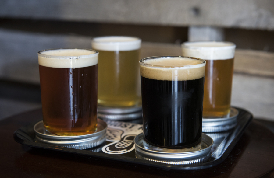 Ghost Runners Brewery’s 5K IPA, Running UP Pils pilsner, Phantom Rojo imperial red and Amanda Hugginkiss Porter raspberry imperial porter are served in a flight in Vancouver are seen in June.