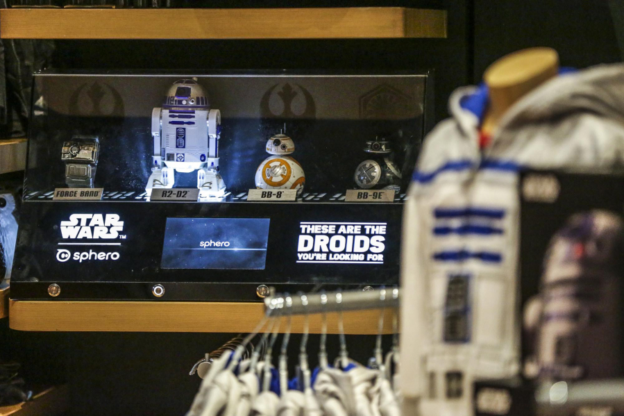Sphero R2-D2 and BB-9E app-enabled droids sit on display at the Walt Disney Co. store in New York.