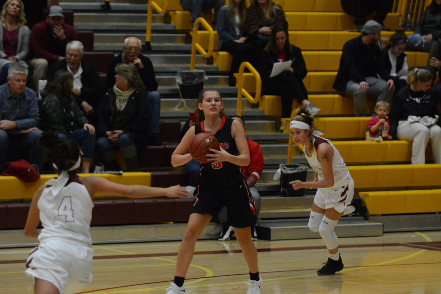 Camas wing Jordyn Wilds looks to pass against Prairie earlier this season. The Papermakers are the defending 4A Greater St. Helens League champions, but will have to adjust lineups after losing starting post Madison Freemon to a knee injury.