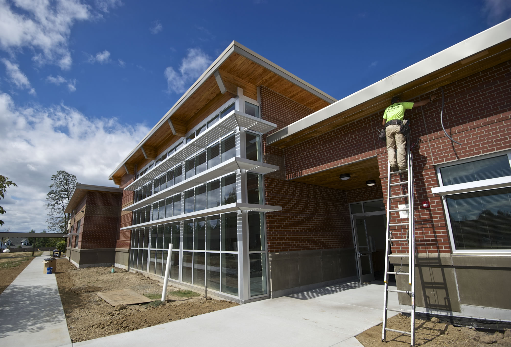 Workers scramble to finish a new building at Ridgefield High School the day before the start of classes in September 2014. A bond issue likely to go before voters in February 2019 would most likely be used to build a new K-4 school and for additional expansions at Ridgefield High School, Superintendent Nathan McCann said.