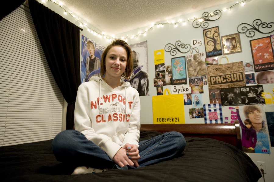When this photo was taken in 2011, Alora Munday-Davis was 12 years old and her bedroom was a shrine to Bieber Fever. That passion is over now, she said, and these days what she’s into is herself.