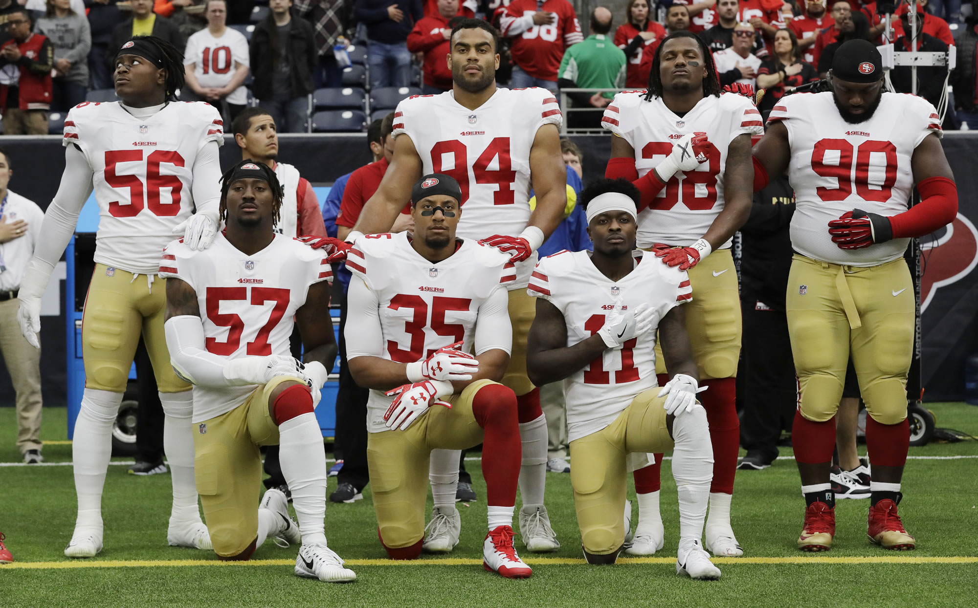 President Donald Trump's feud with the NFL about players kneeling during the national anthem is the runaway winner for the top sports story of 2017 in balloting by AP members and editors.  (AP Photo/David J.