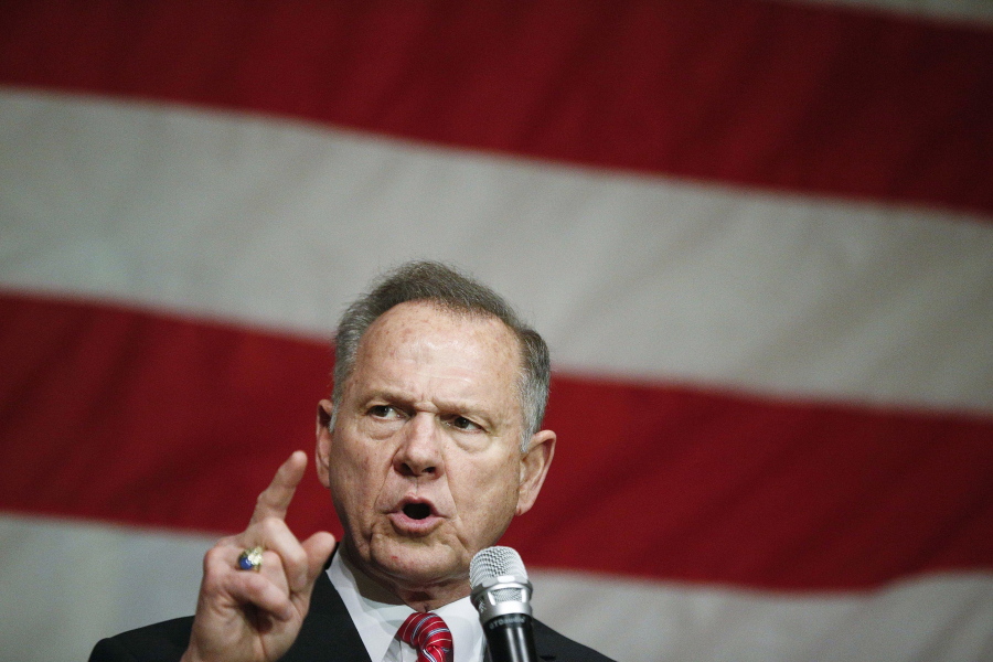 Former Alabama Chief Justice and U.S. Senate candidate Roy Moore speaks Dec. 5 at a campaign rally, in Fairhope Ala. Alabama voters pick between Republican Roy Moore and Democrat Doug Jones on Tuesday.