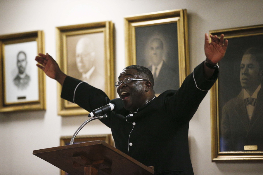 Pastor Arthur Price Jr., preaches during a 16th Street Baptist church service, Sunday, Dec. 10, 2017, in Birmingham, Ala. Price told the mostly black congregation that Alabama’s U.S. Senate election is too important to skip. “There’s too much at stake for us to stay home,” Price said of Tuesday’s election.
