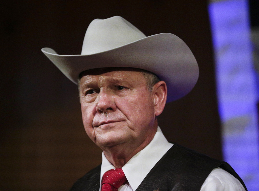 FILE - In this Monday, Sept. 25, 2017, file photo, former Alabama Chief Justice and U.S. Senate candidate Roy Moore speaks at a rally, in Fairhope, Ala. In the face of sexual misconduct allegations, Moore's U.S. Senate campaign has been punctuated by tense moments and long stretches without public appearances. Moore faces Democrat Doug Jones for Alabama's U.S. Senate seat in the Dec. 12 election.