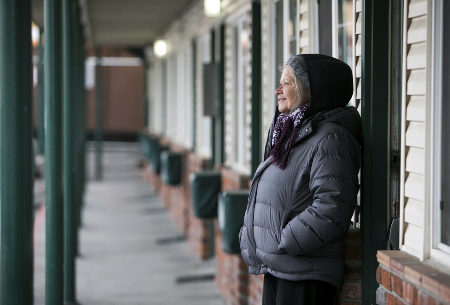 Kathleen “Kaat” Snyder Ryan stands outside her room at Bethlehem Inn in Bend, Ore. Ryan has been staying at the shelter since September. She moved to Bend in 2011 to be near her brother.