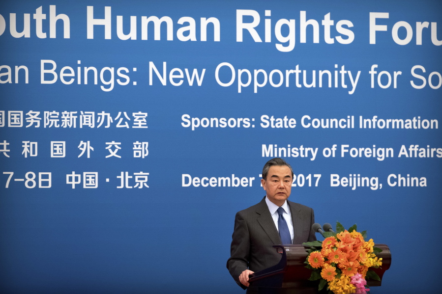 Chinese Foreign Minster Wang Yi speaks during the South-South Human Rights Forum at the Great Hall of the People in Beijing, Thursday, Dec. 7, 2017. China opened a human rights forum attended by developing countries Thursday in its energetic drive to showcase what it considers the strengths of its authoritarian political system under President Xi Jinping.