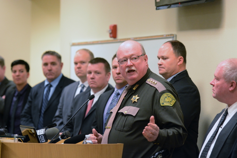 This Dec. 13, 2017 photo shows Whatcom County Sheriff Bill Elfo announcing the arrest of Timothy Forrest Bass, 50, of Everson in Bellingham, Wash., in connection with the 1989 abduction and murder of 18-year-old Amanda T. “Mandy” Stavik of Acme. In the three decades since Stavik vanished while jogging near her Acme home in 1989, her murder has devastated those who knew her, gripped the public’s attention and frustrated law-enforcement officers as they searched for answers. (Philip A.