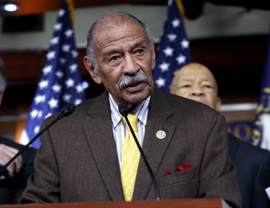 Rep. John Conyers, D-Mich., speaks Feb. 14 at a news conference on Capitol Hill in Washington. House Minority Leader Nancy Pelosi, D-Calif., the top Democrat in the House, said Thursday that Conyers should resign, saying the accusations are “very credible.” (AP Photo/J.