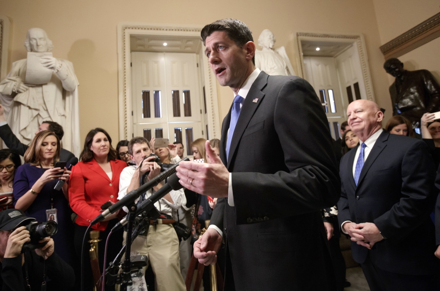 Speaker of the House Paul Ryan, R-Wis., joined at right by House Ways and Means Committee Chairman Kevin Brady, R-Texas, meets reporters just after passing the Republican tax reform bill in the House of Representatives, on Capitol Hill, in Washington, Tuesday, Dec. 19, 2017. The vote, largely along party lines, was 227-203 and capped a GOP sprint to deliver a major legislative accomplishment to President Donald Trump after a year of congressional stumbles. (AP Photo/J.