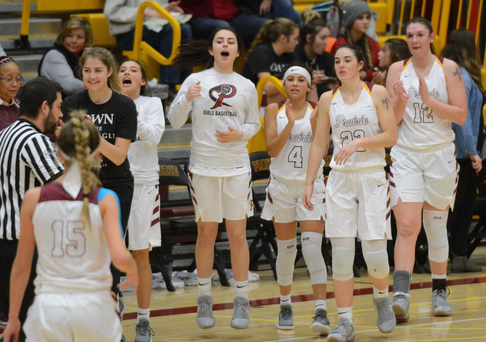 Prairie girls basketball celebrates in the moments following a 52-27 win over Union on Wednesday, Dec.
