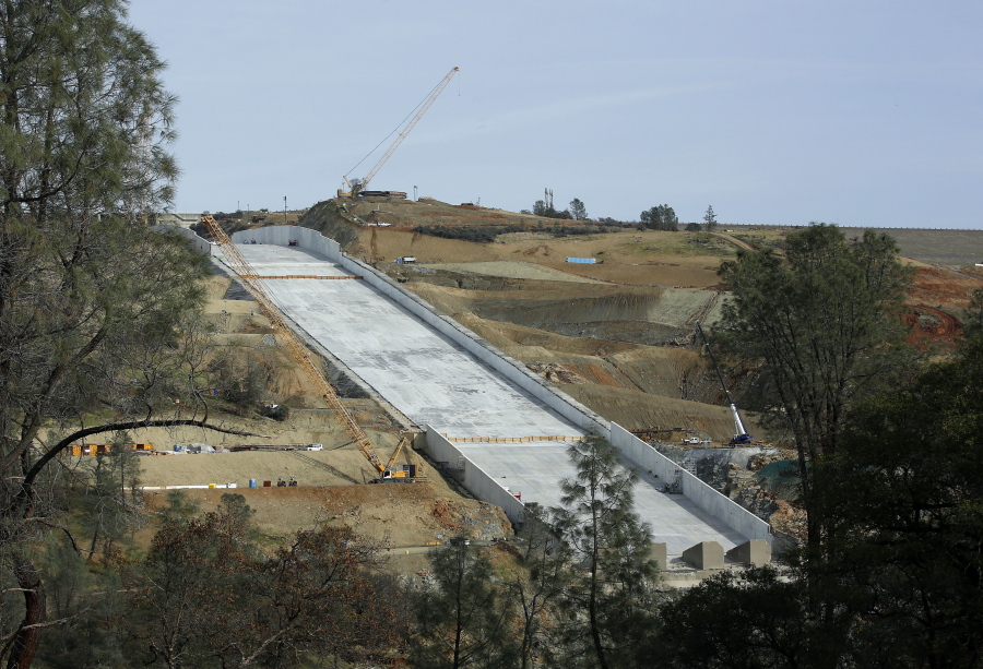 Work continues Nov. 30 on the Oroville Dam spillway in Oroville, Calif. California water officials plan to update a Northern California community about their efforts to repair the nation’s tallest dam after damage to its spillways forced nearly 200,000 people to evacuate last February.