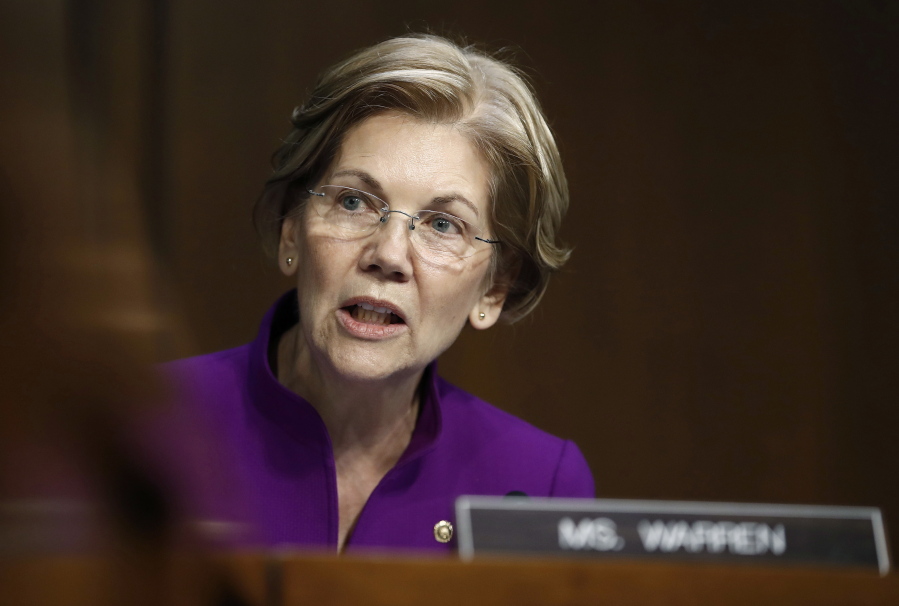 FILE - In this Nov. 28, 2017 file photo, Sen. Elizabeth Warren, D-Mass., speaks during a Senate Banking, Housing, and Urban Affairs Committee hearing on Capitol Hill in Washington.
