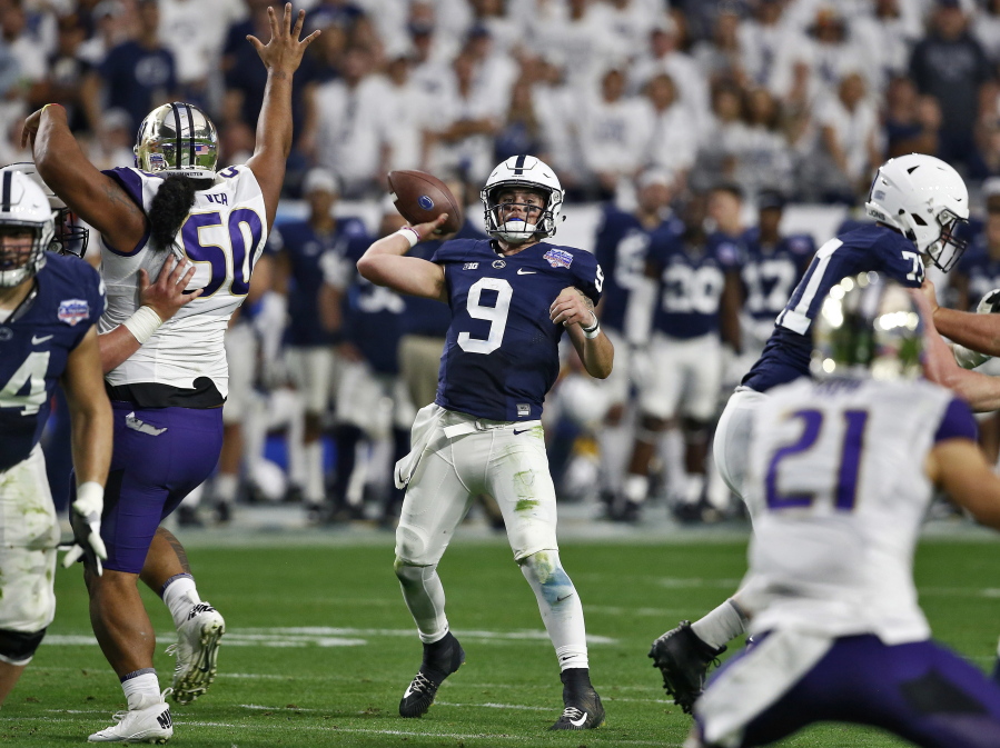 Penn State quarterback Trace McSorley (9) throws against Washington during the second half of the Fiesta Bowl NCAA college football game, Saturday, Dec. 30, 2017, in Glendale, Ariz. (AP Photo/Ross D.