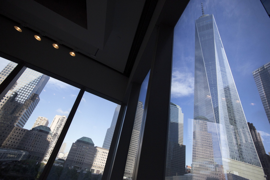 FILE - In this Aug. 15, 2016, file photo, window seating in the Eataly restaurant offers a view of One World Trade Center, right, in New York. Share prices were higher in Europe on Monday, Dec. 18, 2017, after a day of robust gains in Asia as investors anticipated passage of U.S. tax legislation that could boost corporate profits in the world’s largest economy.