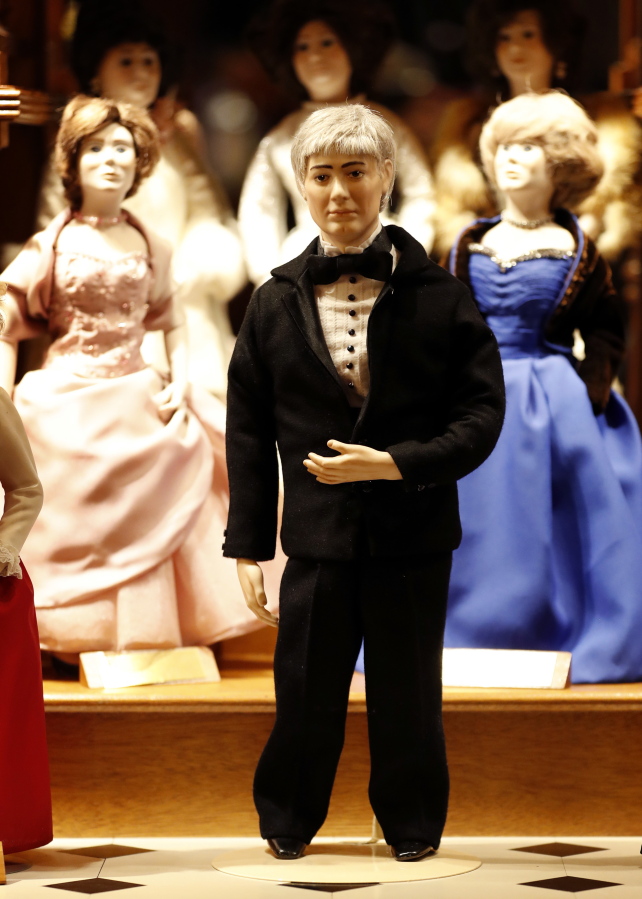 A doll of Kevin Reynolds, husband of Iowa Gov. Kim Reynolds, is displayed Wednesday, Dec. 20, 2017, at the Statehouse in Des Moines, Iowa. The case holds dolls of most Iowa first ladies in history, dating back to territorial governors. Reynolds is the first female governor in the state’s history.