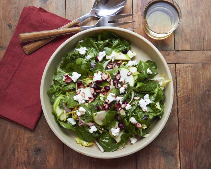 Winter Greens, Apple, Cranberry and Goat Cheese Salad With Sherry-Mustard Dressing can be one of the vegetarian offerings that help non-meat-eaters make a real dinner out of what’s often a meat-centered holiday feast.