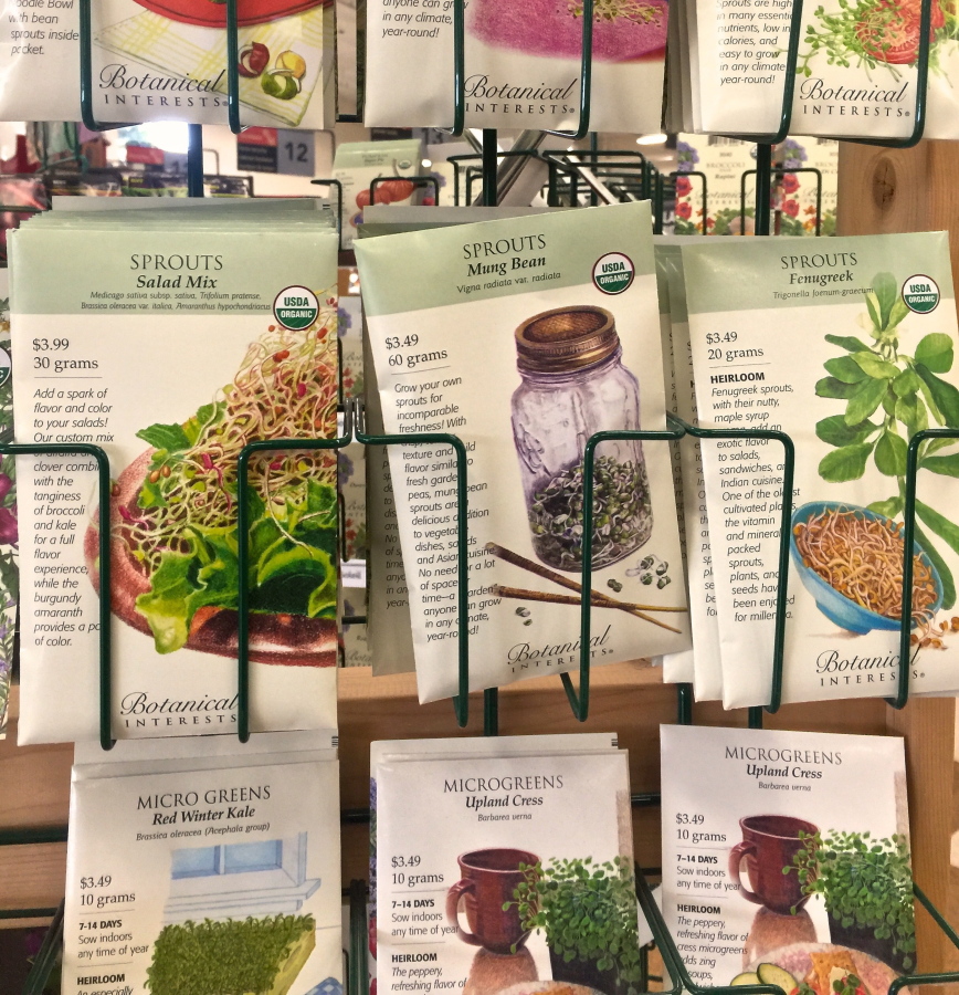 Seed packets are great reference tools. While the front of the packets show how the seeds will look when they mature, the back describes everything needed to grow them .