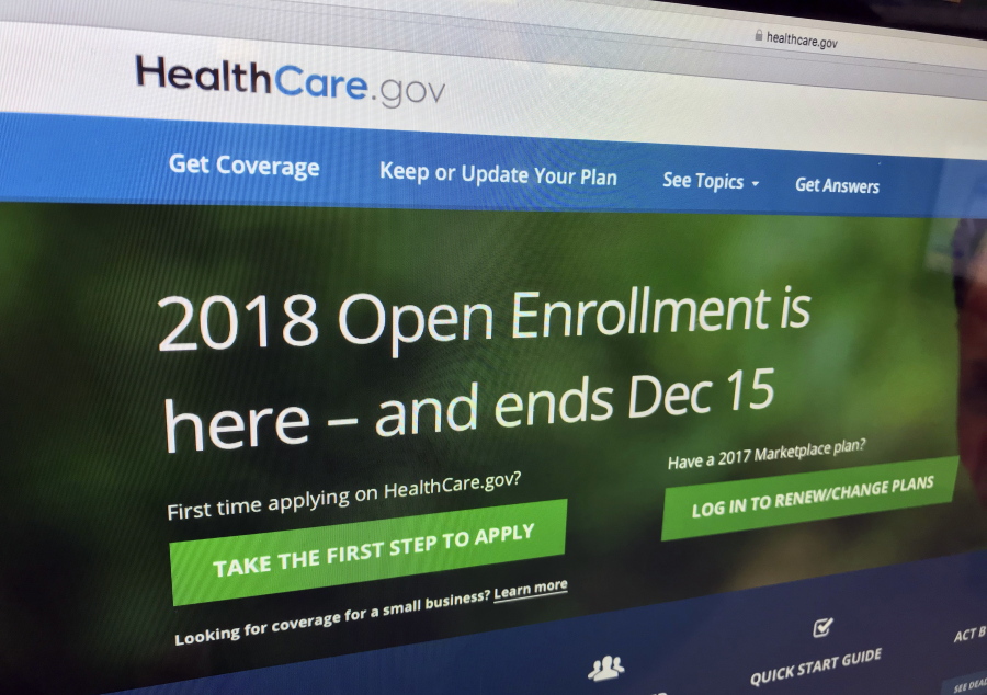 The HealthCare.gov website is photographed in Washington on Dec. 15, 2017. A burst of sign-ups is punctuating the end of a tumultuous year for former President Barack Obama’s health care law. Strong consumer interest around Friday’s enrollment deadline for 2018 was seen as validation for the program’s subsidized individual health insurance. But the Affordable Care Act’s troubles aren’t over. Even if full repeal now seems off the table, actions by the Republican-led Congress and the Trump administration could undermine the ACA’s insurance markets.