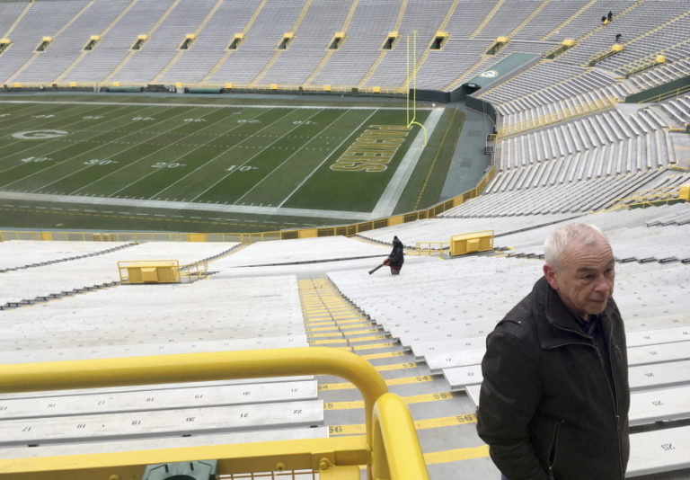 Patrick Webb, executive director of the Green Bay/Brown County Professional Football Stadium District, recalls watching a game known as the “Ice Bowl,” at Lambeau Field in Green Bay, Wis. Webb spoke from near the spot where he stood during the game 50 years ago between the Dallas Cowboys and Green Bay Packers played in sub-zero temperatures. (AP Photo/Genaro C.