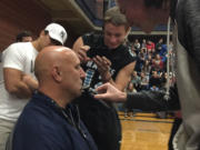 Hockinson football coach Rick Steele, as a part of a bet, had his mustache shaved by his players after they presented the state championship trophy to the high school on Friday, December 15.