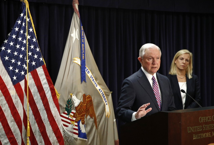 Attorney General Jeff Sessions, left, speaks alongside Secretary of Homeland Security Kirstjen Nielsen during a news conference in Baltimore, Tuesday to announce efforts to combat the MS-13 street gang with law enforcement and immigration actions.