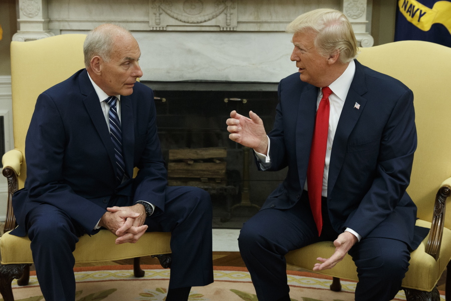 FILE - In this July 31, 2017, file photo, President Donald Trump talks with new White House Chief of Staff John Kelly after he was privately sworn in during a ceremony in the Oval Office in Washington. For an administration that has spent 2017 throwing off headlines at a stunningly dizzying pace, the frenetic fortnight in the second half of July reached an unparalleled breakneck speed. Set amid the backdrop of a president grappling with his deepest insecurities, the West Wing’Äôs breakdown in policy collided with its collapse in personnel and acted as a crucial inflection point for Trump’Äôs first year in office.