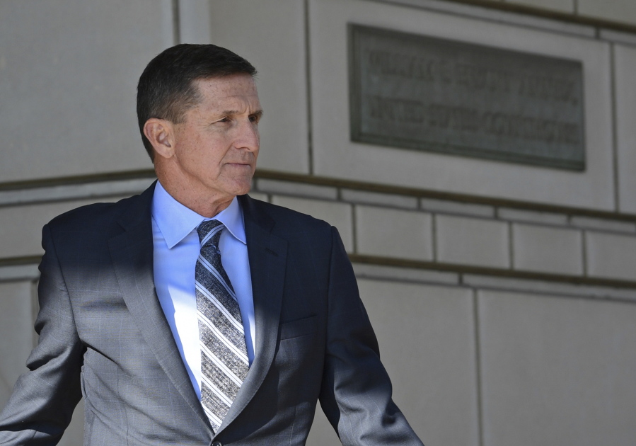 In this Dec. 1, 2017 photo, former Trump national security adviser Michael Flynn leaves federal court in Washington. A whistleblower has told House Democrats that during President Donald Trump’s inauguration speech, Flynn texted a former business associate to say a private nuclear proposal Flynn had lobbied for would have his support in the White House.