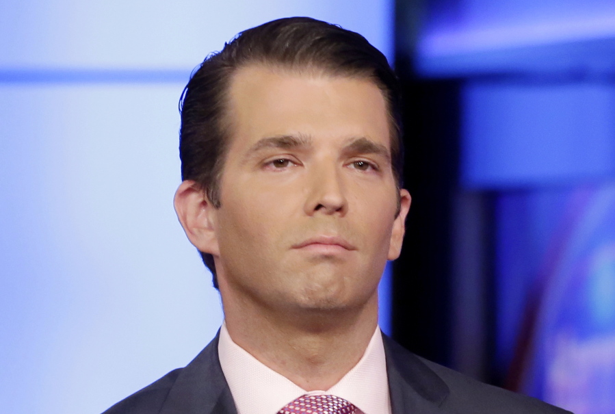 FILE - In this July 11, 2017, file photo, Donald Trump Jr. is interviewed by host Sean Hannity on his Fox News Channel television program, in New York. Trump has arrived on Capitol Hill for a private interview as part of the House intelligence committee’s investigation into Russian interference in the 2016 election.