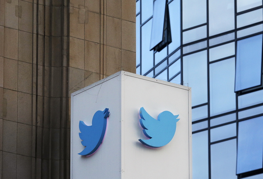 This Wednesday, Oct. 26, 2016, photo shows a Twitter sign outside of the company’s headquarters in San Francisco. Twitter will be enforcing stricter policies on violent and abusive content such as hateful images or symbols, including those attached to user profiles, the company announced Monday, Dec. 18, 2017.
