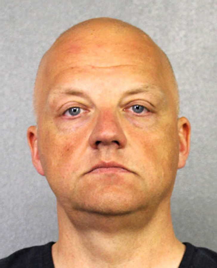 FILE - This January 2017 file photo provided by the Broward County Sheriff’s Office shows German Volkswagen executive Oliver Schmidt. Prosecutors are seeking a seven-year prison sentence for Schmidt, a Volkswagen senior manager who pleaded guilty in the automaker’s U.S. diesel emissions scandal. Schmidt will be sentenced Wednesday, Nov. 6, 2017 in Detroit federal court.