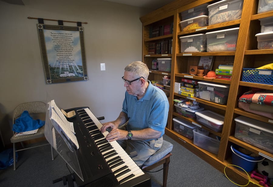 Franck Geuder, an organist at St. John Lutheran Church, shares a song with the group at Graceful Living Activity Center in August. Geuder and his wife, Beverly Hohman, were in Hawaii on Saturday when a false missile alert was announced.