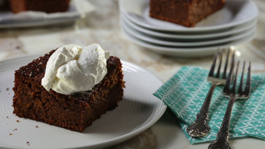 Ginger, cinnamon, cloves (or pepper) and molasses flavor a classic gingerbread.