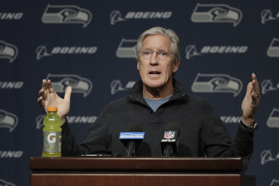 Seattle Seahawks NFL football head coach Pete Carroll talks to reporters, Tuesday, Jan. 2, 2018, during his end-of-season press conference, in Renton, Wash. (AP Photo/Ted S.