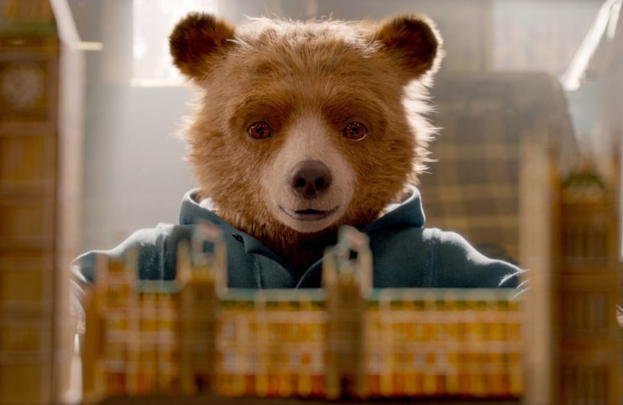 Paddington, voiced by Ben Whishaw, wants to buy his Aunt Lucy a birthday present in “Paddington 2.” Warner Bros.