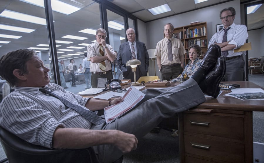 Washington Post editor Ben Bradlee played by Tom Hanks, foreground, confers with members of the newspaper’s staff, played by, from left, David Cross, John Rue, Bob Odenkirk, Jessie Mueller and Philip Casnoff in “The Post.” Niko Tavernise/Twentieth Century Fox