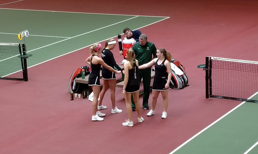 Portland State women’s tennis coach Jay Sterling gathers his players prior to their match against UC Davis on Saturday, Feb. 20, 2018, at Club Green Meadows in Vancouver.
