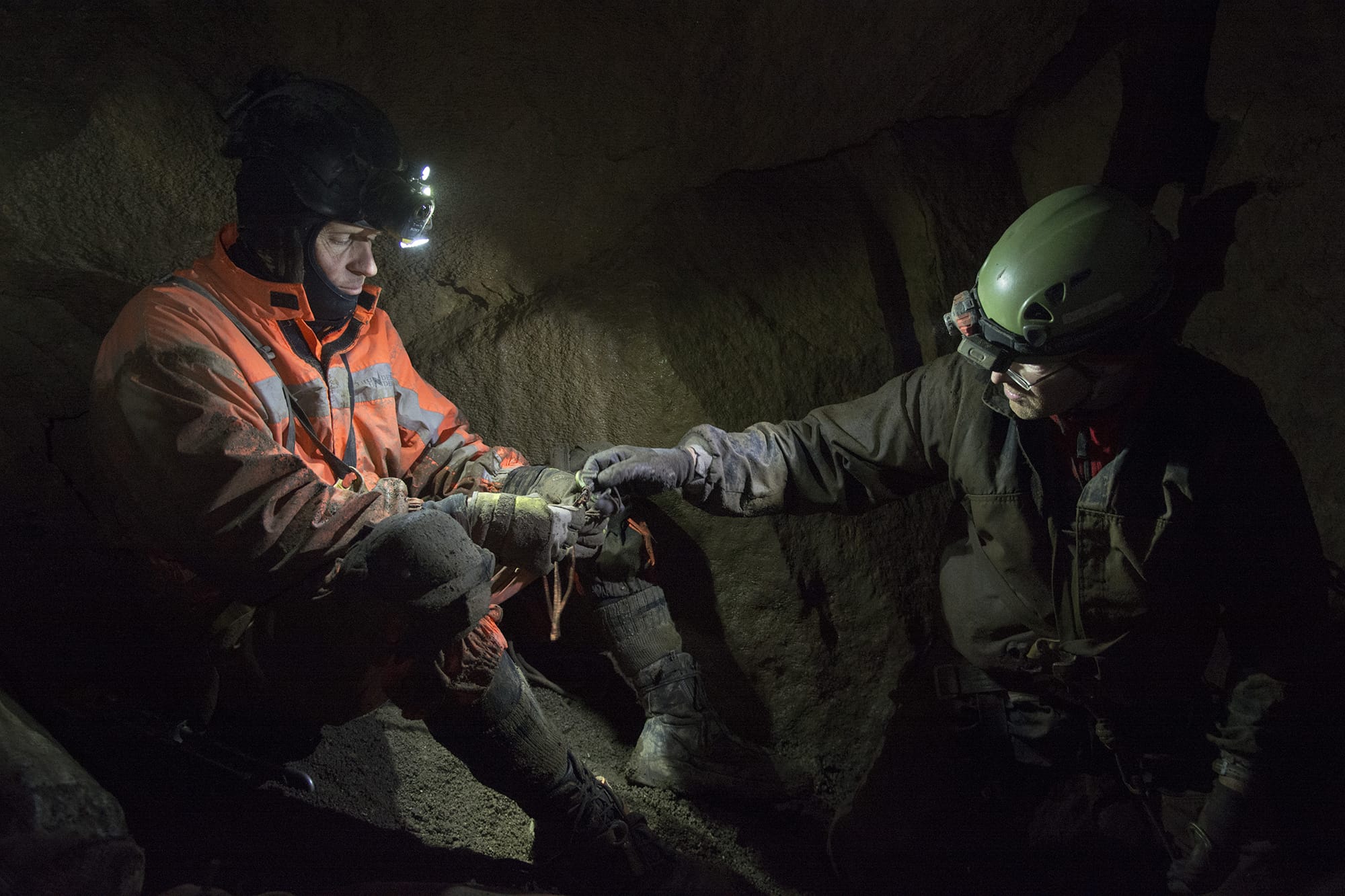 Cavers explore a cave near Mount St.