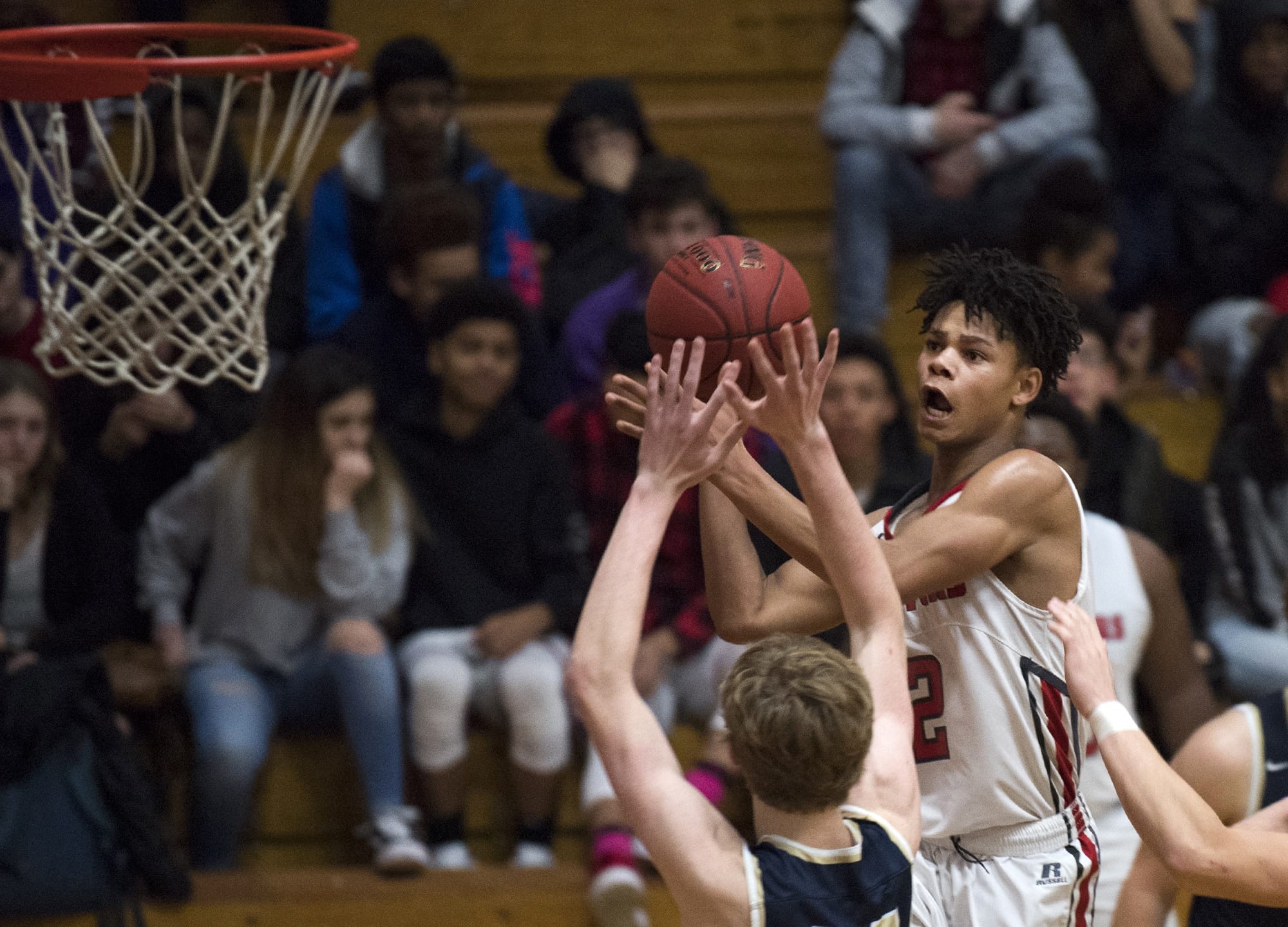 Fort Vancouver's Johnny Green eyes the basket for a shot during Friday night's game against Kelso at Fort Vancouver High School on Jan. 12, 2018.