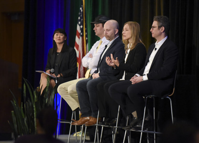 Moderator Mei Wu, from left, joins panelists Andy Lowery of RealWear, Kevin Getch of Webfor, Dorota Shortell of Simplexity Product Development and Aaron Holm of Blokable Inc. during the 2018 Economic Forecast Breakfast at the Hilton Hotel in downtown Vancouver, Thursday morning January 18, 2018.