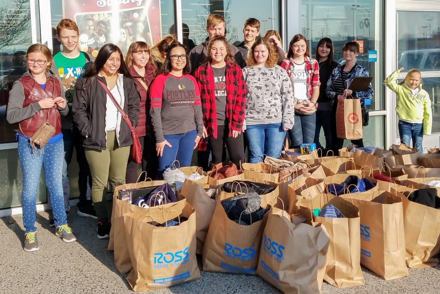 Woodland: Woodland High School’s Interact Club and other student volunteers assisted with Woodland Rotary Club’s annual Christmas Giving Program by buying clothes, food and gifts for more than 100 families.