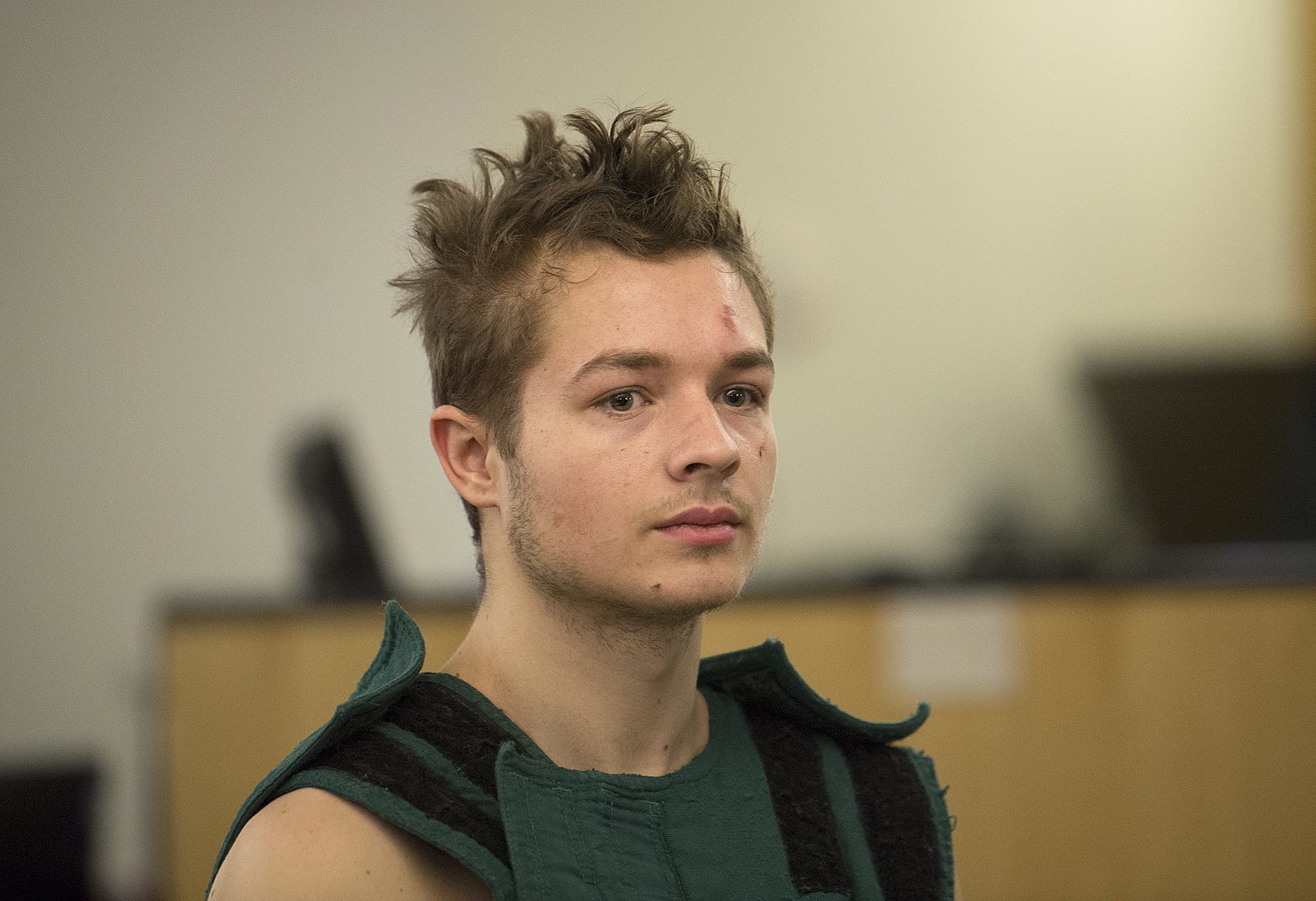 Colin Dixon makes a first appearance in Clark County Superior Court on Friday morning, Jan. 19, 2018. (Amanda Cowan/The Columbian) Colin Dixon, 21, of Battle Ground appeared in Clark County District Court on charges stemming from an alleged knife attack on his family.