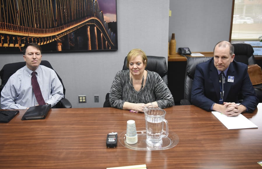 Evergreen Public Schools Chief Operating Officer Mike Merlino, left, school board director Victoria Bradford and Superintendent John Steach meet with The Columbian Editorial Board on Monday to discuss the district’s $695 million bond request.